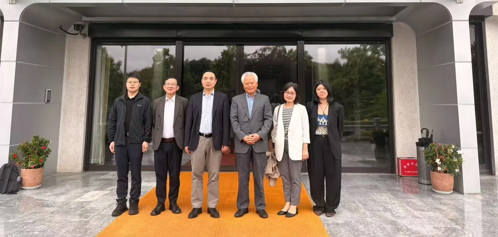 Yang Li, Dr. Wu Shicun, Dr. Hong Nong, Liu Mengzhen and Wang Tengfei with Ambassador Cai Run, June 2026