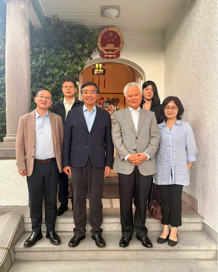 Yang Li, Dr. Wu Shicun, Dr. Hong Nong, Liu Mengzhen and Wang Tengfei with Ambassador Fei Shengchao, June 2026