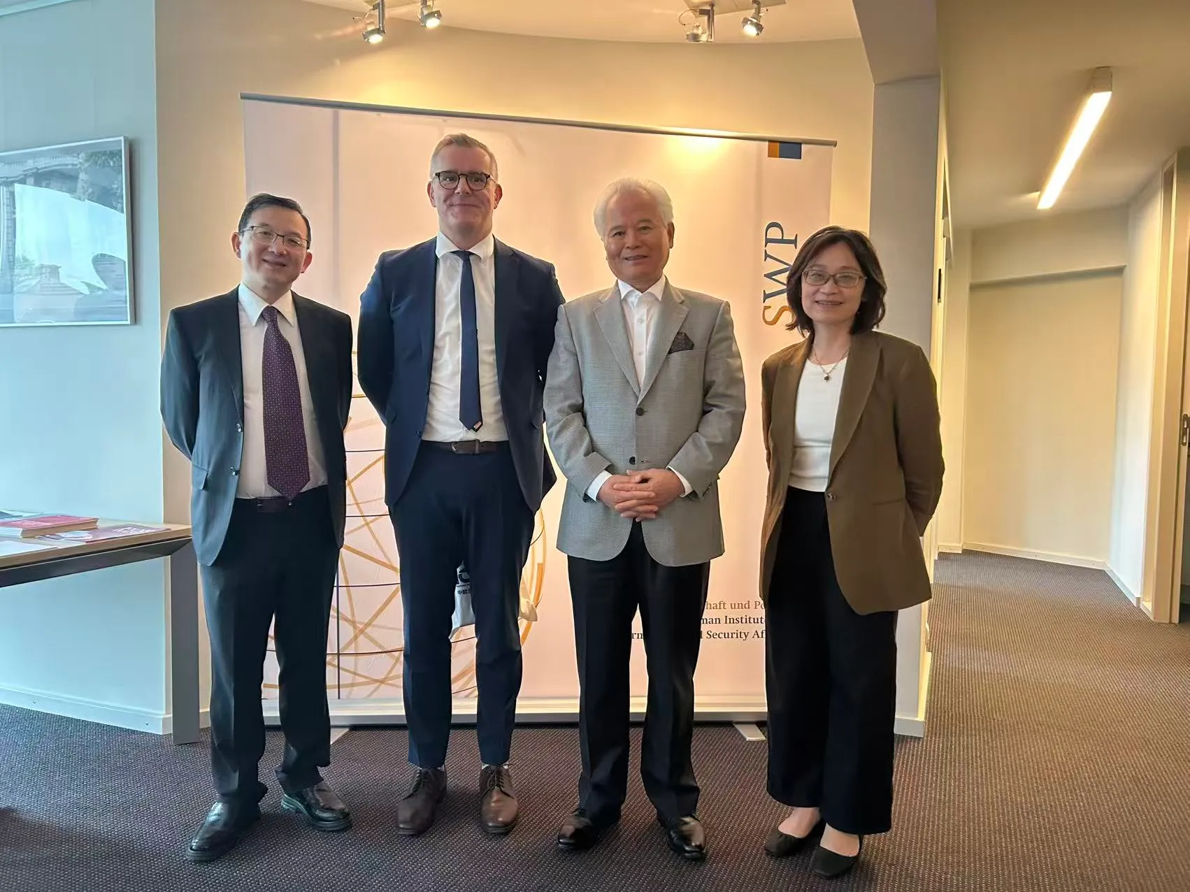 Yang Li, Dr. Wu Shicun, Dr. Hong Nong and Dr. André Härtel, June 2026