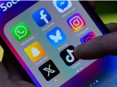 Smartphone showing TikTok, Instagram, and social media apps