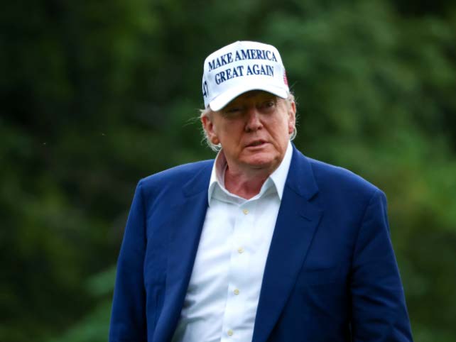 Donald Trump wearing Make Europe Great Again hat