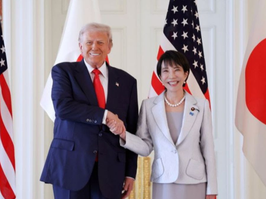 Trump and Japanese leader shaking hands