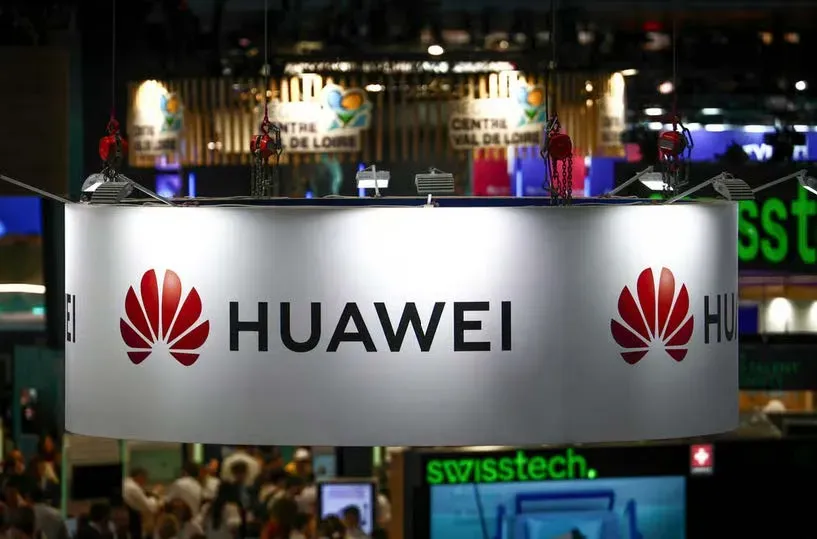 Huawei logo and booth at a telecom event