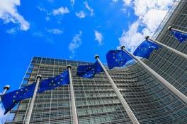 European Commission building with EU flags