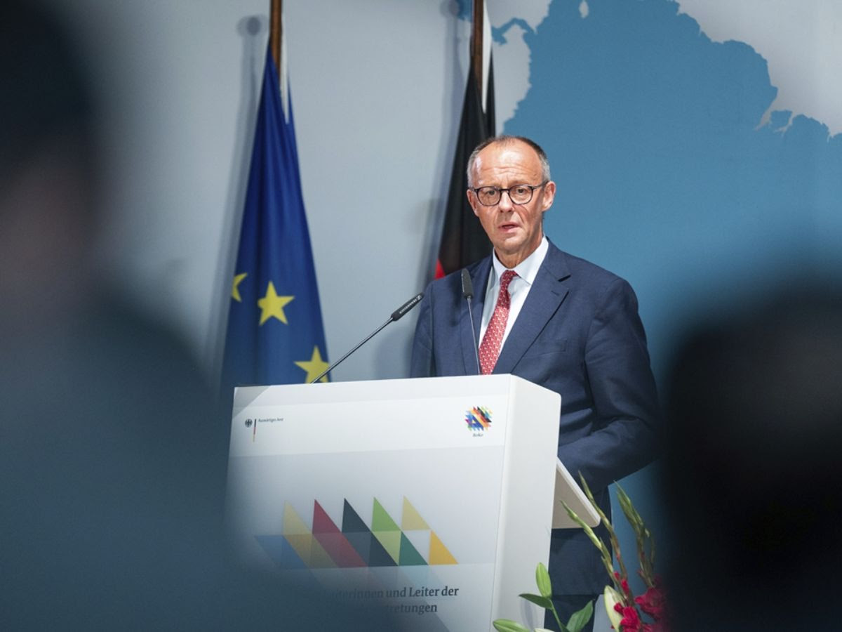 German Chancellor Friedrich Merz speaking at Berlin conference