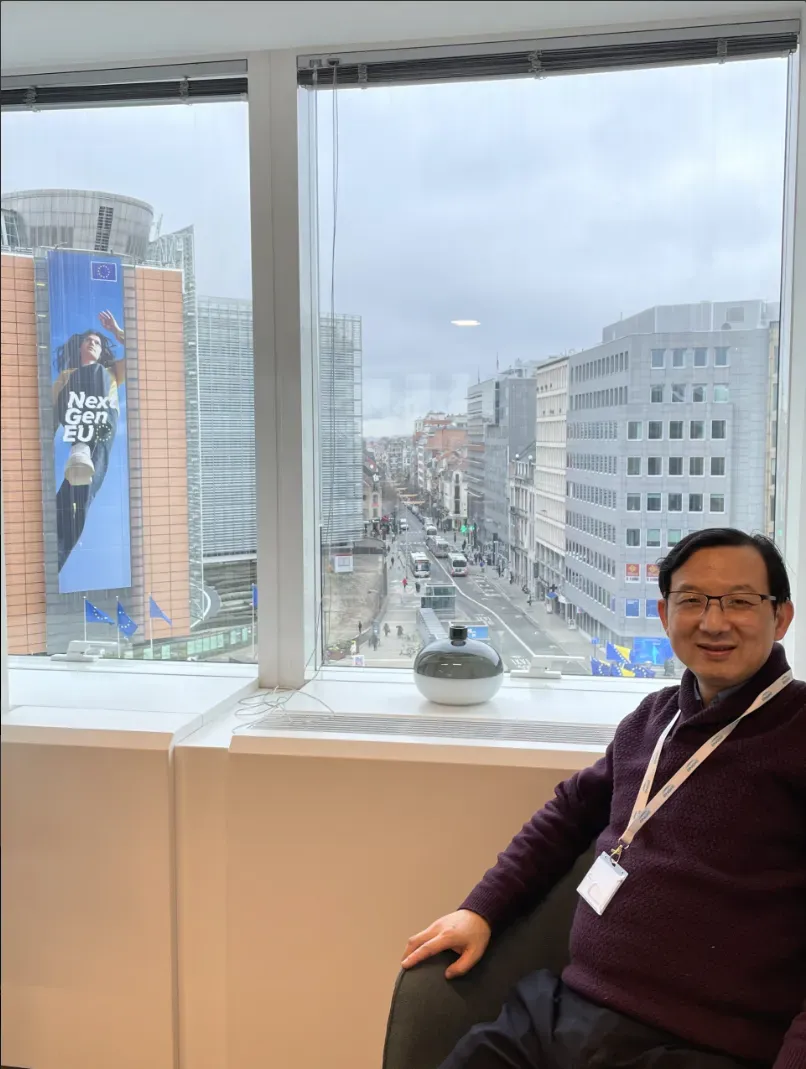 Executive Director Yang Li, Attending an ICES Meeting in the